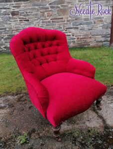 Red iron back with deep buttoning