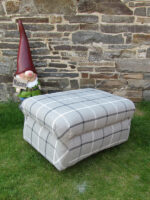 Grey tartan chunky footstool. Large chunky footstool covered in a grey tartan fabric to match new living room decor.