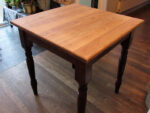 Refurbished tables. Stripped and re-varnished bar tables at 'The Monachty' in Aberaeron.