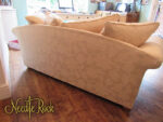 Country Cottage 2-seater sofa (back view). Country Cottage 2-seater sofa covered in 'putty' linen embroidered upholstery fabric (back view).
