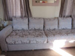 Static caravan upholstery Large static caravan reupholstered in a 2 fabric design, plain on the arms, pattern on cushions.