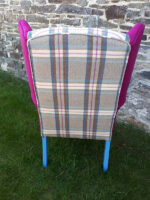 Gorgeous bright & bold refurbished armchair (back). Gorgeous bright & bold refurbished armchair, with sentimental 'Welsh carthen', matching 'magenta, and vibrant blue paintwork (back).