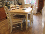 Refurbished table and chairs. Refurbished table and chairs - light painted legs, table top stripped and varnished with new upholstery.