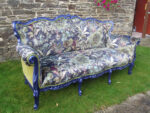 Designer upholstered Statement Piece sofa. Designer upholstered Statement Piece sofa, with botanical-themed scene from 'Arley House' and Designers Guild velvet.