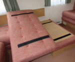 If you need velcro - just ask! Static caravan upholstery, in a gorgeous orange weave and contrasting buttons.