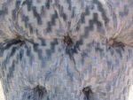 Deep-buttoning Close-up of deep-buttoning