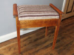 Refinished piano stool. Refinished piano stool with horizontal autumnal stripe.