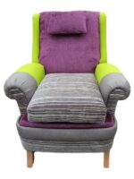 Striking revamped reclining Parker Knoll armchair. Reclining Parker Knoll reupholstered to clients' brief, with new legs to give additional height.