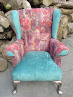 Reupholstered Parker Knoll Wingback armchair. Funky reupholstered Parker Knoll Wingback armchair, pewter-coloured woodwork and tear-drop facings. Unusual but striking!