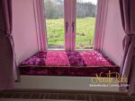 A sparkly windowseat in lustrous pink, with crushed gold piping, for a little princess. A sparkly windowseat in lustrous pink, with crushed gold piping, for a little princess.